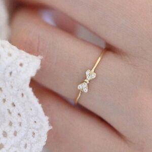 Size 7: Gold plated .925 cubic zirconia bow ring